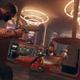Deathloop protagonist Colt Vahn ducks behind cover in an arcade.
